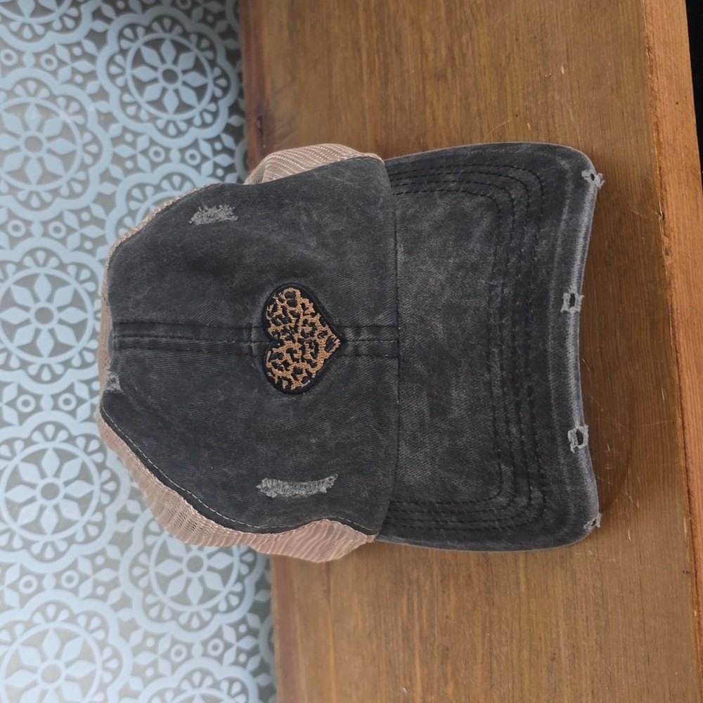 Grey trucker style baseball hat with leopard heart